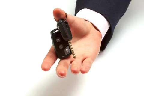 Hand offering key Stock Photos