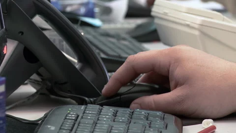 Hand of an Office Employee Moving a PC Mouse, Close Up - 4K Stock Footage 304771680