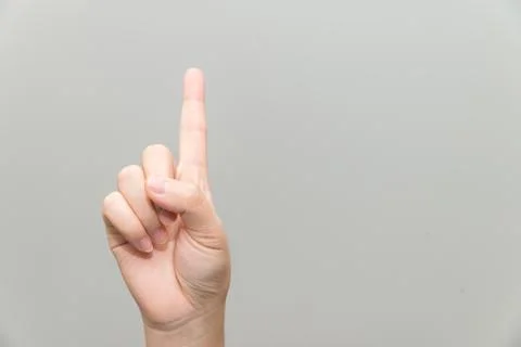 Hand with one finger up Stock Photos