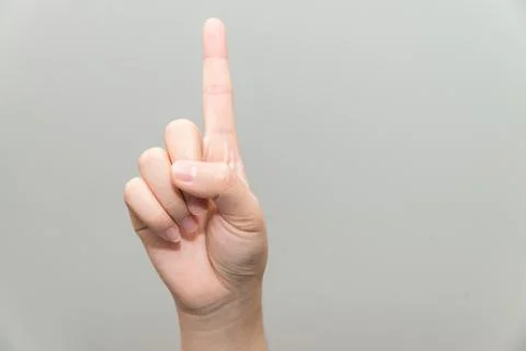 Hand with one finger up Stock Photos