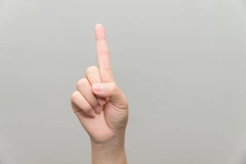 Hand with one finger up Stock Photos
