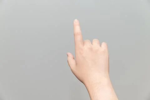Hand with one finger pointing Stock Photos