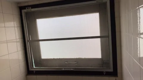 Hand open and close mosquito wire screen on old glass window at home Stock Footage 248942529