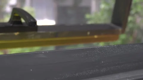 Hand open and lock black door handle window glass at office outdoor rain Stock Footage 251527333