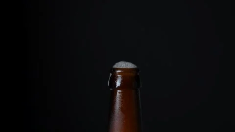 Hand open beer bottle with bottle opener, close-up Stock Footage 251640461