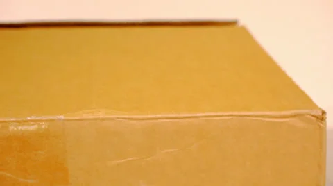Hand open cardboard box. Video shift motion Stock Footage 39815909