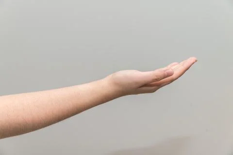Hand with open palm facing up Stock Photos