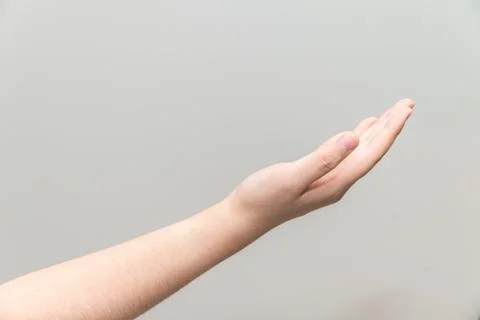 Hand with open palm facing up Stock Photos