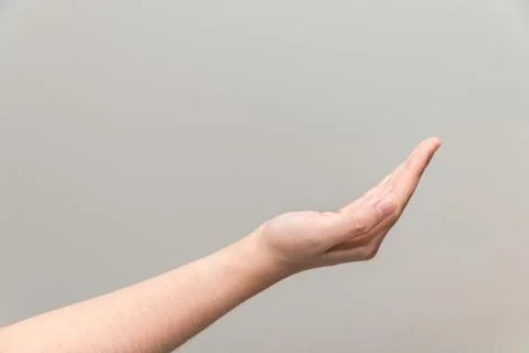 Hand with open palm facing up Stock Photos