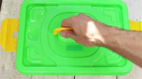 Hand open plastic container with fresh vegetables Stock Footage 123906176