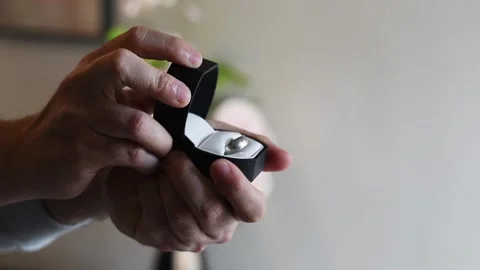Hand open wedding ring box Stock Footage 236595499