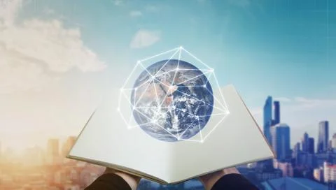 Hand opened book. Elements of this image are furnished by NASA Stock Photos