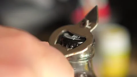 Hand Opening Afri Cola Bottle with a Opener Video stock 342272751