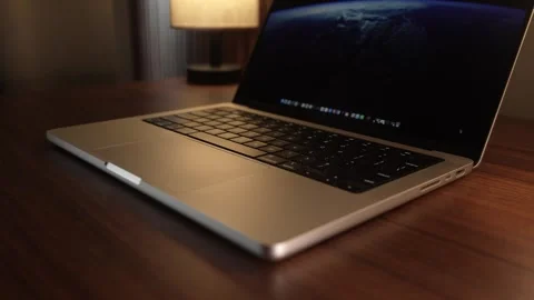 Hand Opening and Closing MacBook Lid in Warm Lighted Room 库存影片 340968176