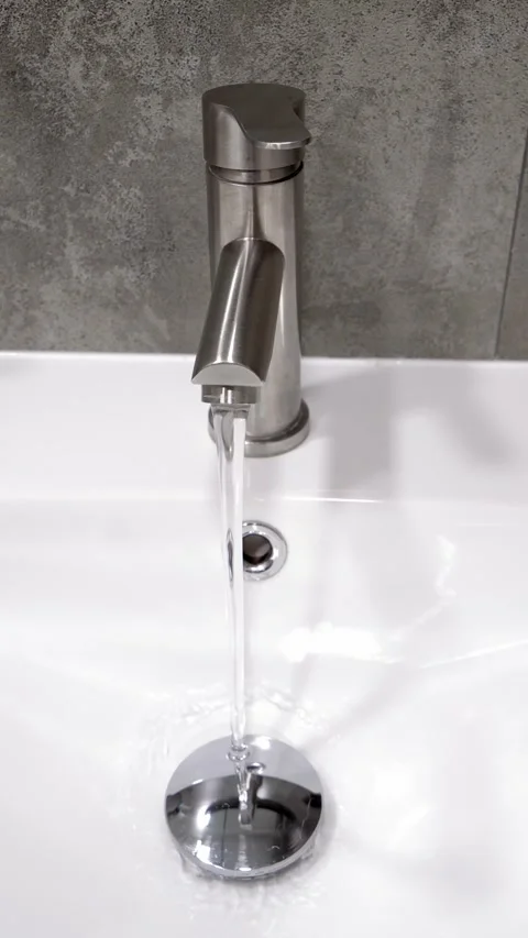 Hand opening and closing modern shower faucet Stock Footage 302542641