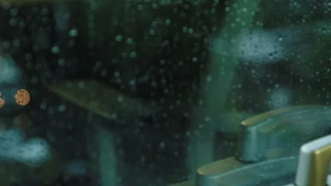 Hand opening and closing the window on a rainy day 動画素材 274332953