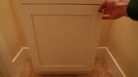 Hand opening a bathroom cupboard Stock Footage 32820647
