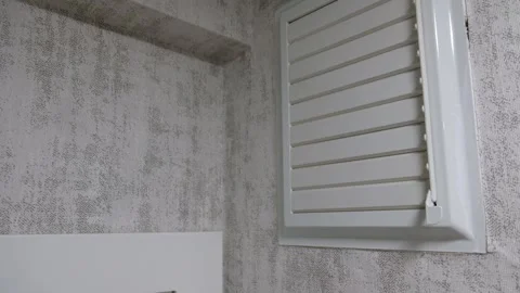 Hand Opening Bathroom Wall Vent Cover for Ventilation or Filter Access Video stock 302688344