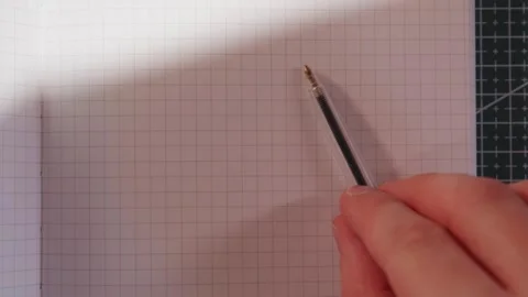 Hand opening blank new notebook to start writing first note Stock Footage 340139162