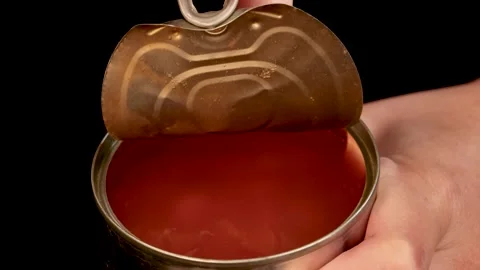 Hand Opening Can of Baked Beans Against Black Background Vídeos de archivo 313968859