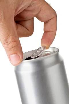Hand opening can pull tab of soda or beer can Stock Photos