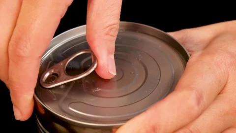 Hand Opening Canned Tomatoes with Pull Tab in Studio Light 動画素材 314755818