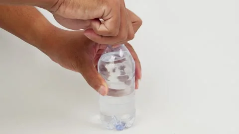 Hand Opening the Cap of a Bottle Stock Footage 327851142