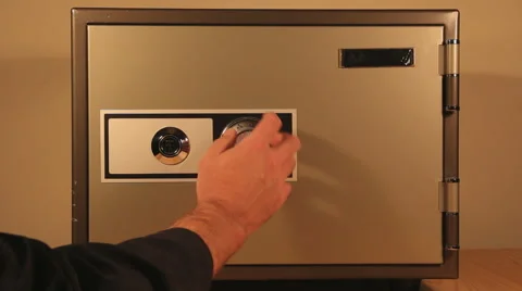 A Hand Opening A Combination Lock On Safe Stock Footage 56203492