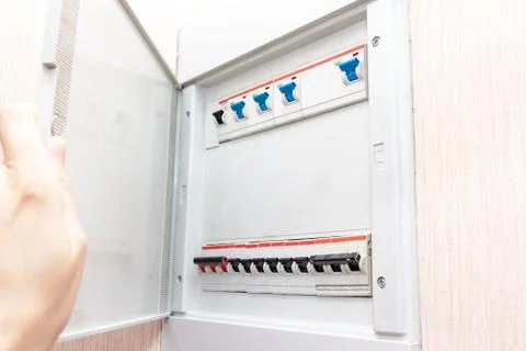 Hand opening electrical shield with automatic switches of electricity in the  Stock Photos
