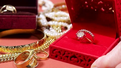 Hand opening a Engagement Ring In Red Velvet Box Held During Romantic Proposal Stock Footage 331592221