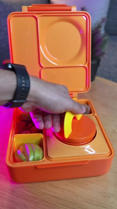 Hand Opening Orange Bento Box With Fruit Stock Footage 346056202