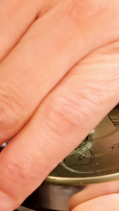 Hand Opening Pull-Tab Canned Food in Close-Up Sequence Stock Footage 315726088