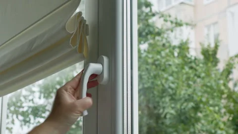 Hand opening PVC window and lifting roman shade home interior ambient sound 库存影片 318624074