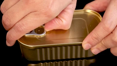 Hand Opening Sardine Can with Pull Tab in Oil Video stock 313911703