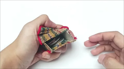 Hand Opening Small Woven Coin Purse Video stock 341648632