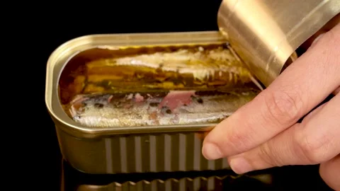 Hand Opening Tin Can of Sardine Chunks in Oil Video stock 314029072