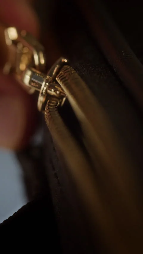 Hand Opening Zipper on Leather Bag in Macro Style Vertical 스톡 동영상 335858746
