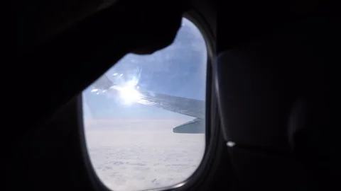A hand opens and close a window in an airplane, porthole Stock Footage 91178284