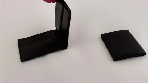 Hand Opens Black Leather Wallet to Reveal Card and Cash Compartments Video stock 321118395