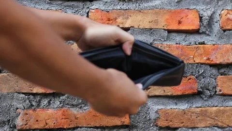 Hand opens a black wallet Stock Footage 323035967