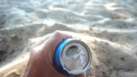 Hand opens a can of beer in slow motion Stock Footage 166091133