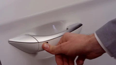 Hand opens car door Stock Footage 93661799