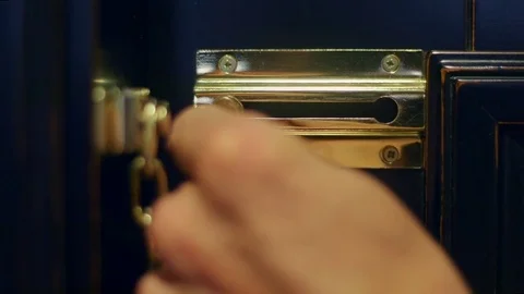 The hand opens the door latch at hotel room Stock Footage 81216718