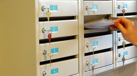 The hand opens the mailbox and pulls out her parcel, closes the cell Stock Footage 58667566