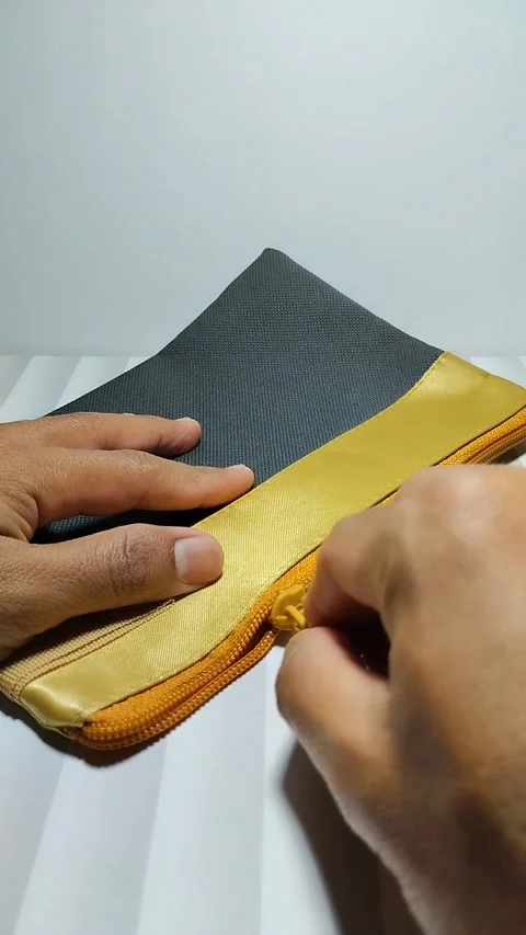 Hand opens the pocket Stock Footage 290856968