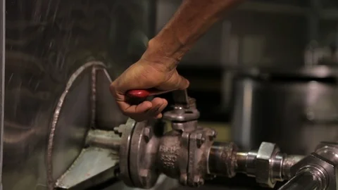 Hand Opens Valve Video stock 124391169