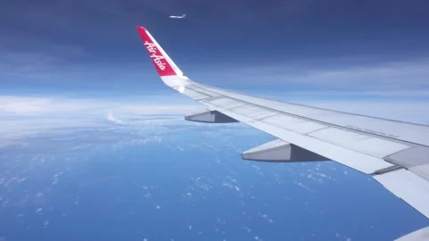 Hand opens window blinds on airplane. Airplane flew past outside Stock Footage 311750516