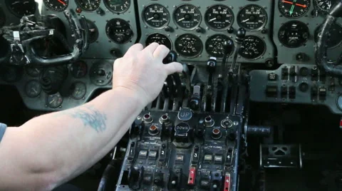 Hand operating engine controls in aircraft 03 Stock Footage 42911773