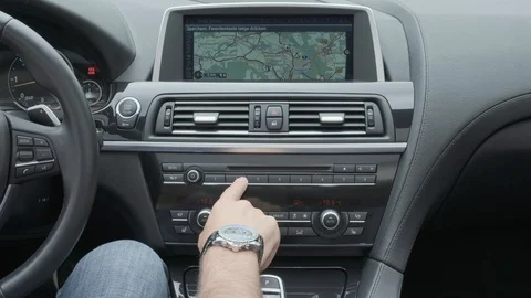 Hand operating luxury car console Stock Footage 91452490