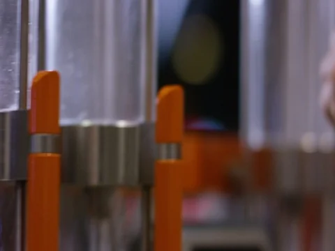 Hand operating the machine handle Stock Footage 83185710